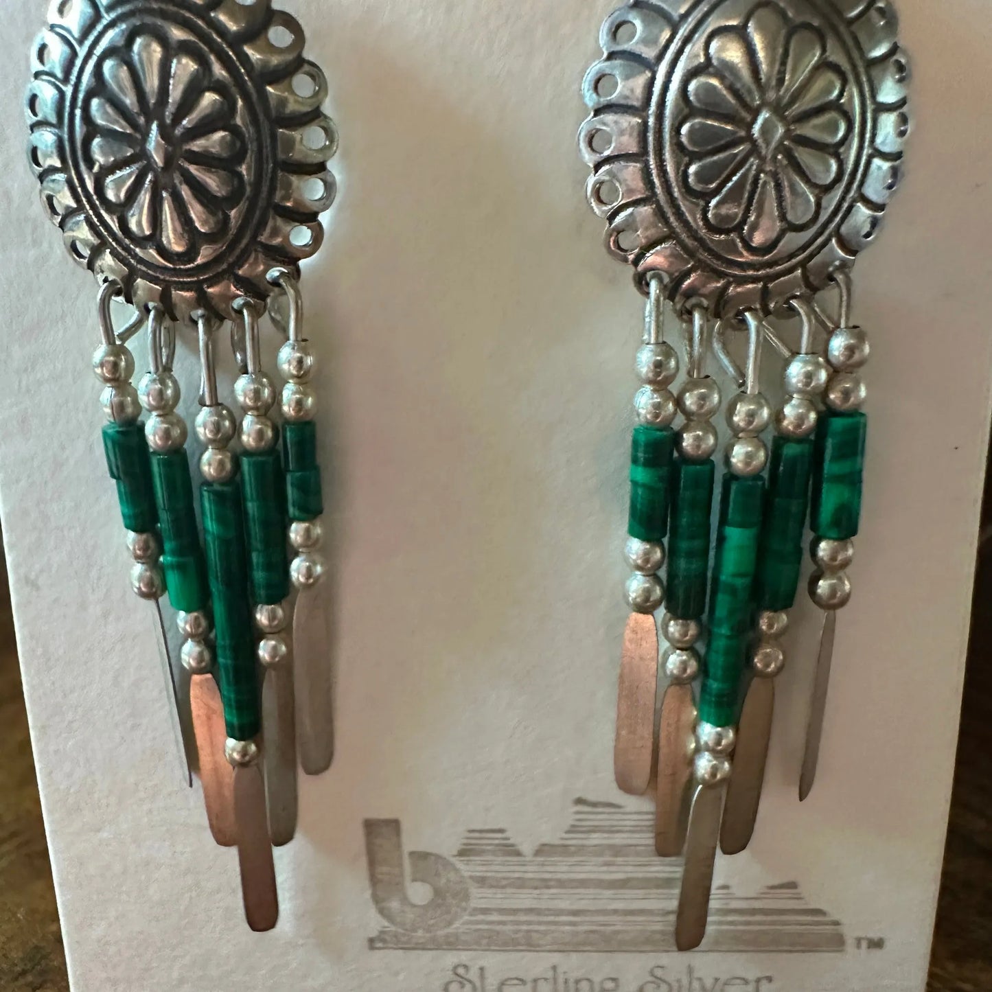Bohemian Grace: Silver & Aventurine Dangle Earrings featuring polished green aventurine stones and sleek silver framework, perfect for any outfit.