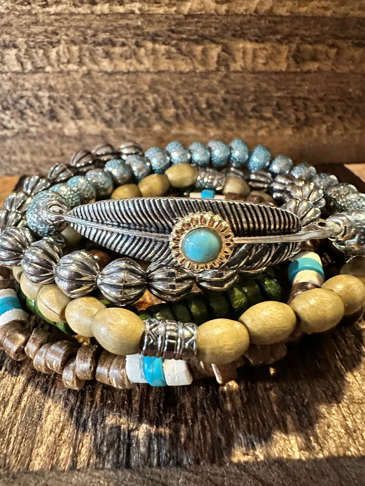 Shop Bohemian Hippie Bracelet Set: 4-piece chic wooden beads & love feather stretch bracelets in a gift box. Stylish, meaningful, and perfect for layering. Buy now! - Silver Elegant
