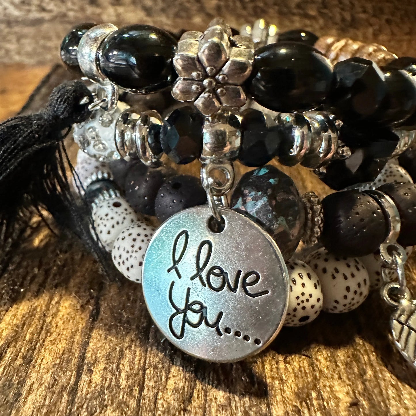 Bohemian Hippie Bracelet Set featuring chic brown wooden beads, love feather charms, and a stretch cord design. 4-piece set in a gift box. - Silver Elegant