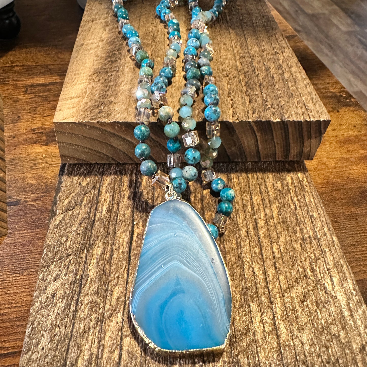 Shop Bohemian Natural Stone Glass Knot Pendant Necklace: Teal drop pendant with a love knot design. Comes in a gift box. Elegant, timeless, and meaningful. Buy now! - Silver Elegant