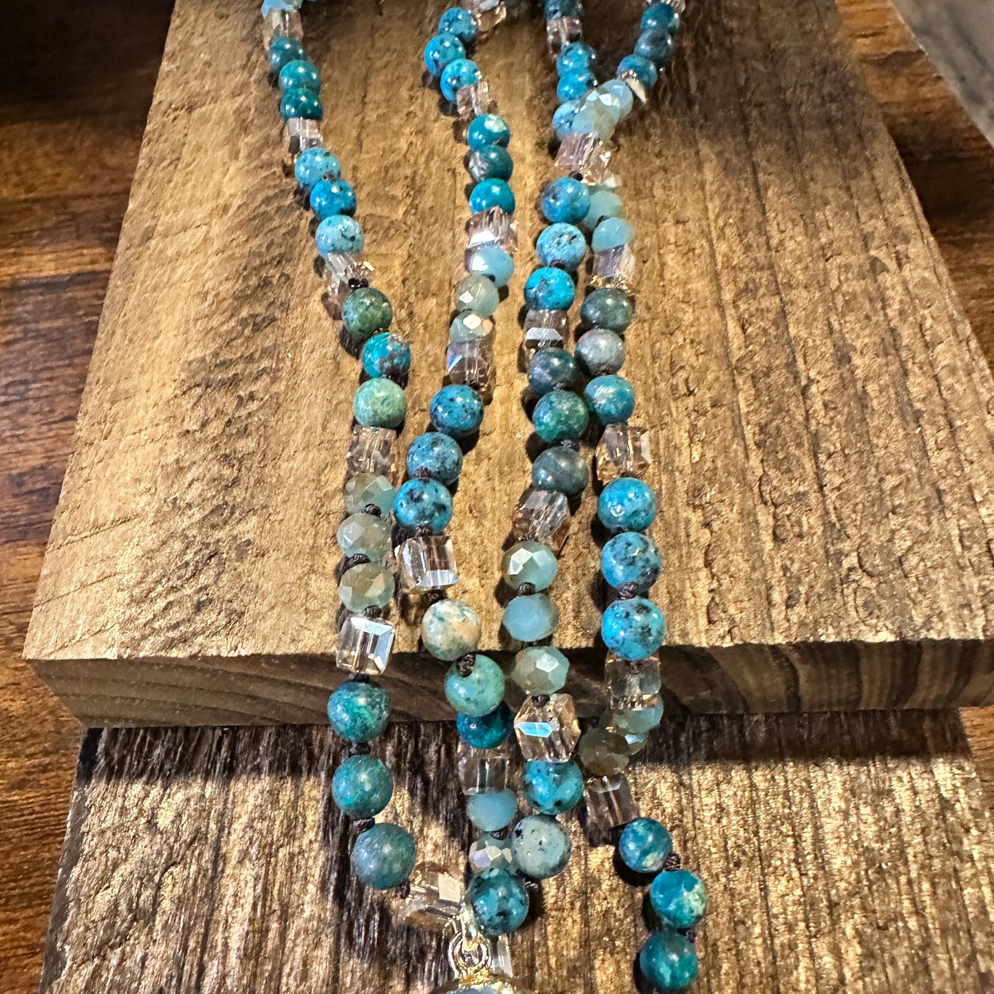 Shop Bohemian Natural Stone Glass Knot Pendant Necklace: Teal drop pendant with a love knot design. Comes in a gift box. Elegant, timeless, and meaningful. Buy now! - Silver Elegant