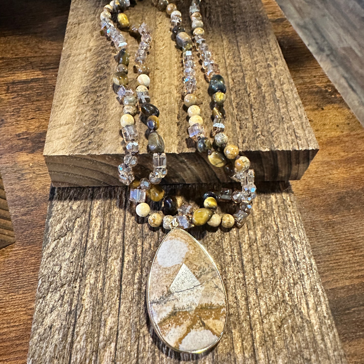 Bohemian Natural Stone Glass Knot Pendant Necklace featuring a brown natural stone pendant with a delicate glass knot design. Ships in an elegant gift box. - Silver Elegant