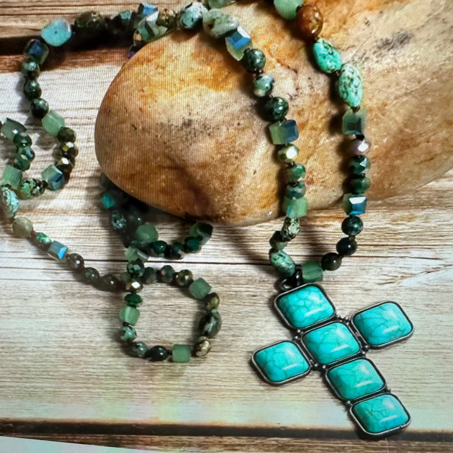 :
Bohemian Turquoise Stone Glass Necklace featuring a sterling silver square cross pendant, handcrafted with turquoise beads, and packaged in a gift box - Silver Elegant