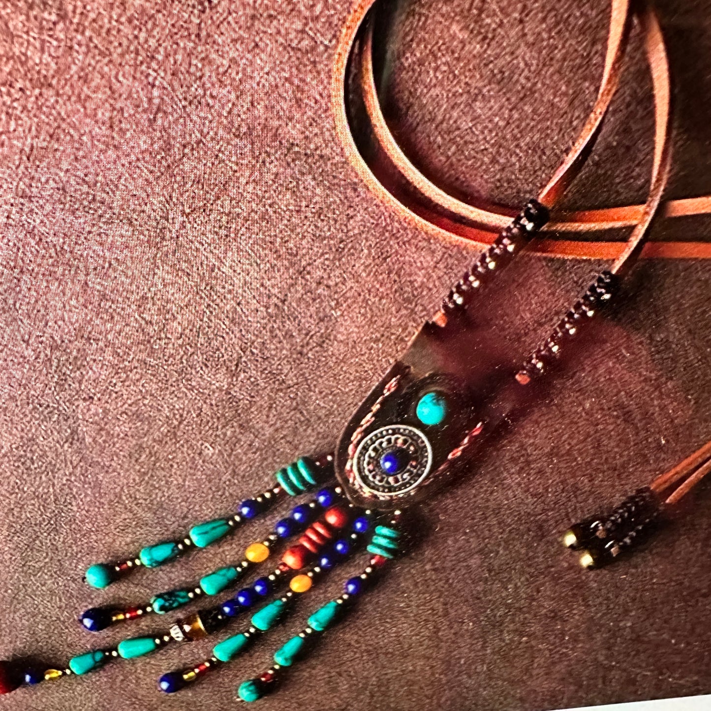 Artisan Boho Beaded Necklace featuring a vintage gemstone centerpiece, leather fringe, and green gemstone accents with gold details, gift boxed. - Silver Elegant