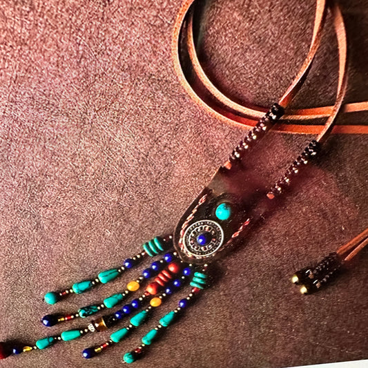 Artisan Boho Beaded Necklace featuring a vintage gemstone centerpiece, leather fringe, and green gemstone accents with gold details, gift boxed. - Silver Elegant
