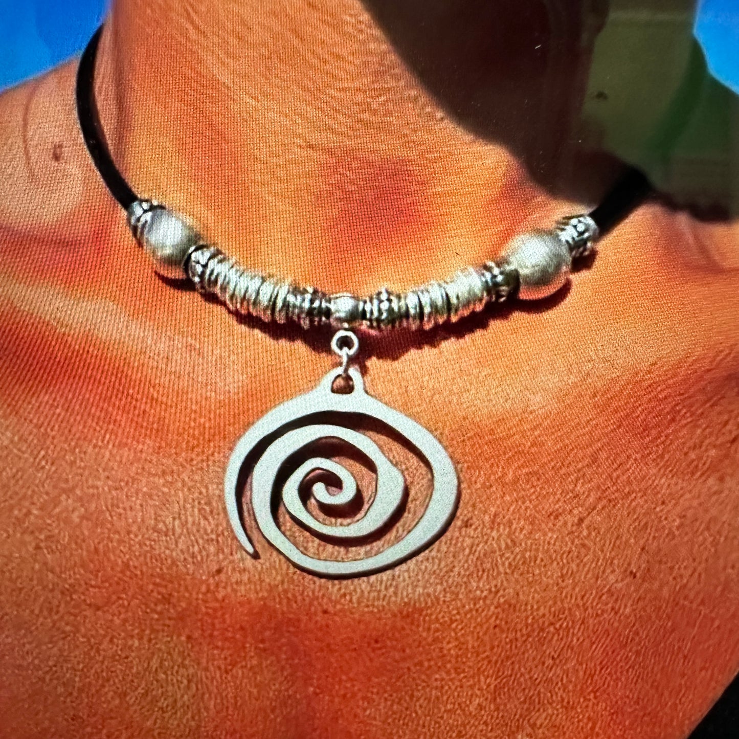 Shop Bohemian Silver Circle Pendant Necklace with Leather Cord. Handmade, elegant, adjustable, and perfect as a gift for her. Comes in a stylish gift box. Buy now! - Silver Elegant