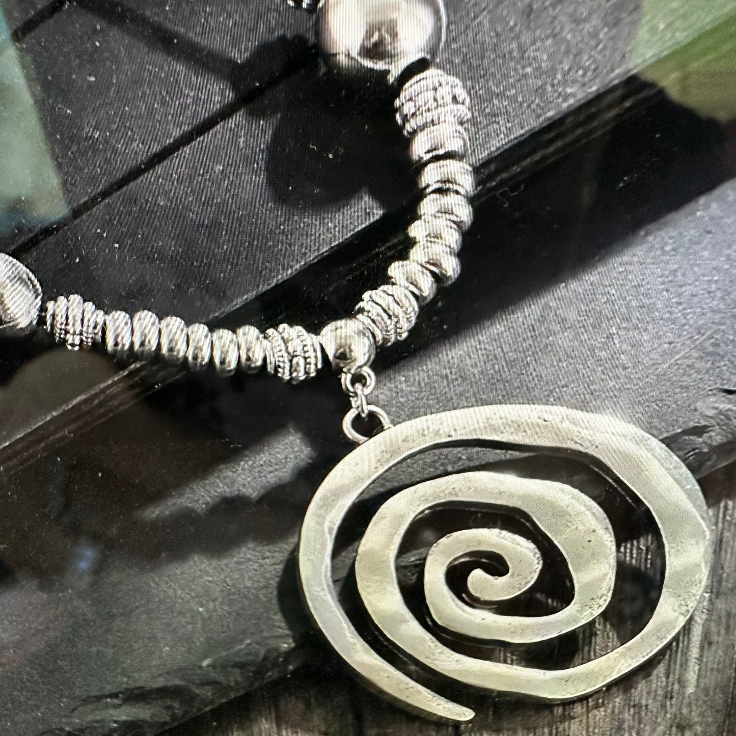 Shop Bohemian Silver Circle Pendant Necklace with Leather Cord. Handmade, elegant, adjustable, and perfect as a gift for her. Comes in a stylish gift box. Buy now! - Silver Elegant