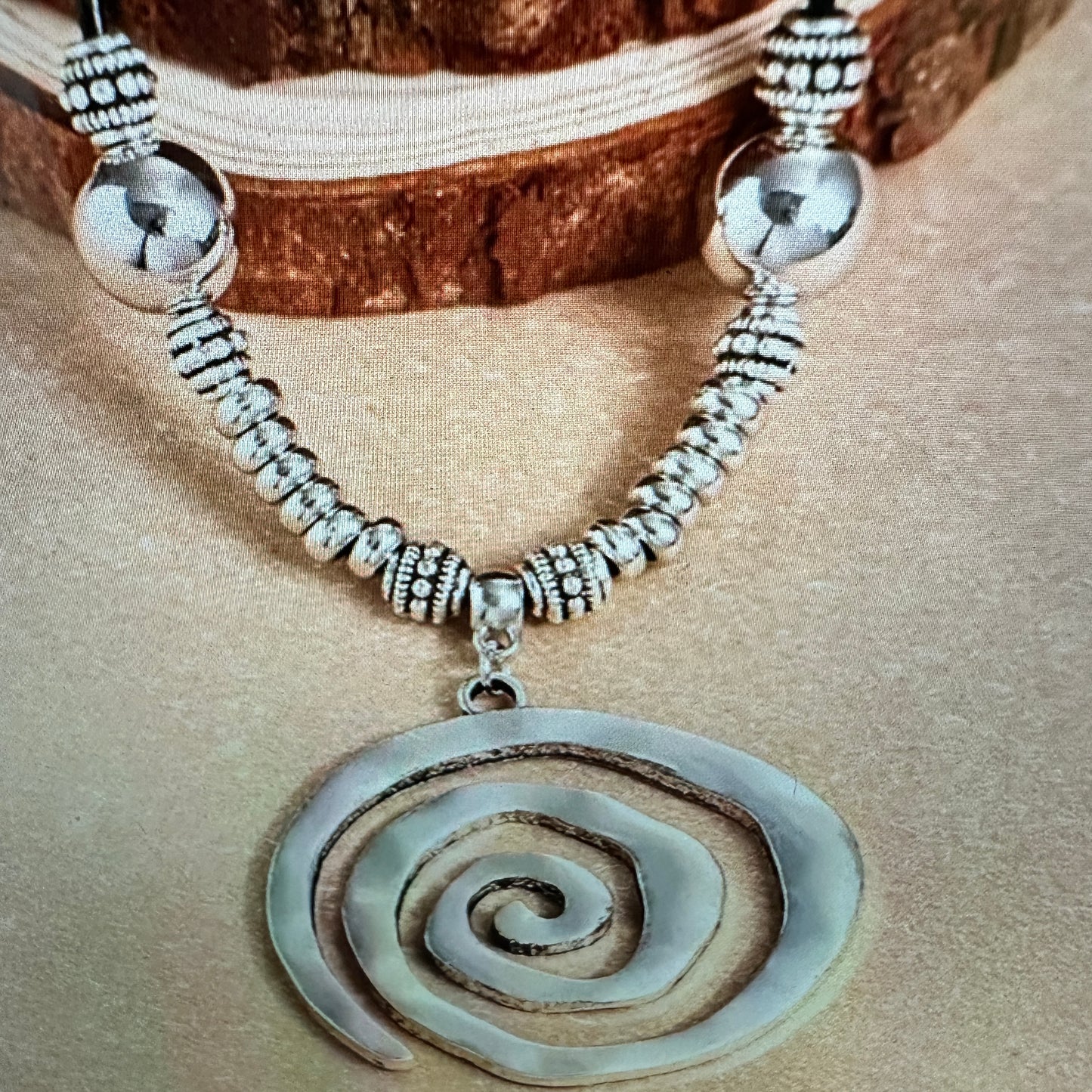 Shop Bohemian Silver Circle Pendant Necklace with Leather Cord. Handmade, elegant, adjustable, and perfect as a gift for her. Comes in a stylish gift box. Buy now! - Silver Elegant