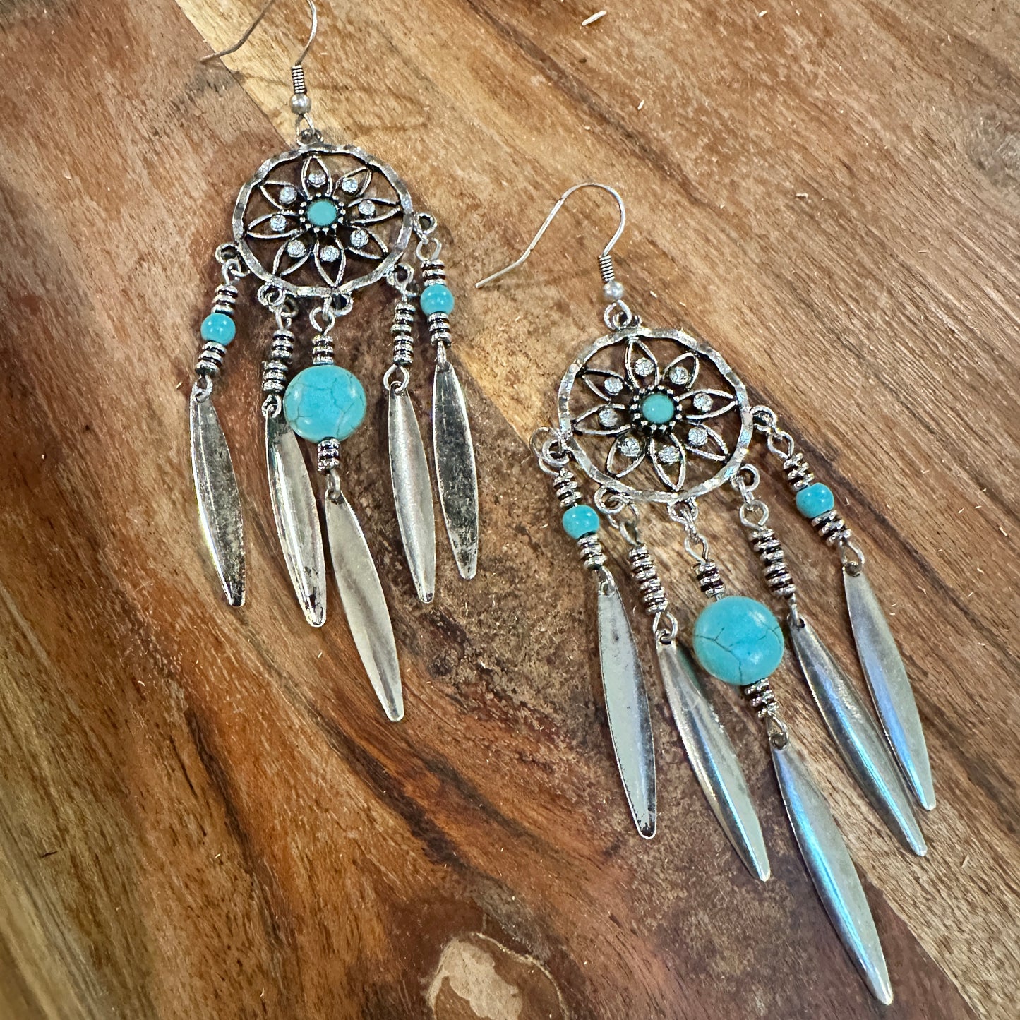 Bohemian Hippie Chic Dream Catcher Feather Drop Earrings featuring delicate silver feathers, dream catcher details, and lightweight design, ships in a gift box- Sliver Elegant