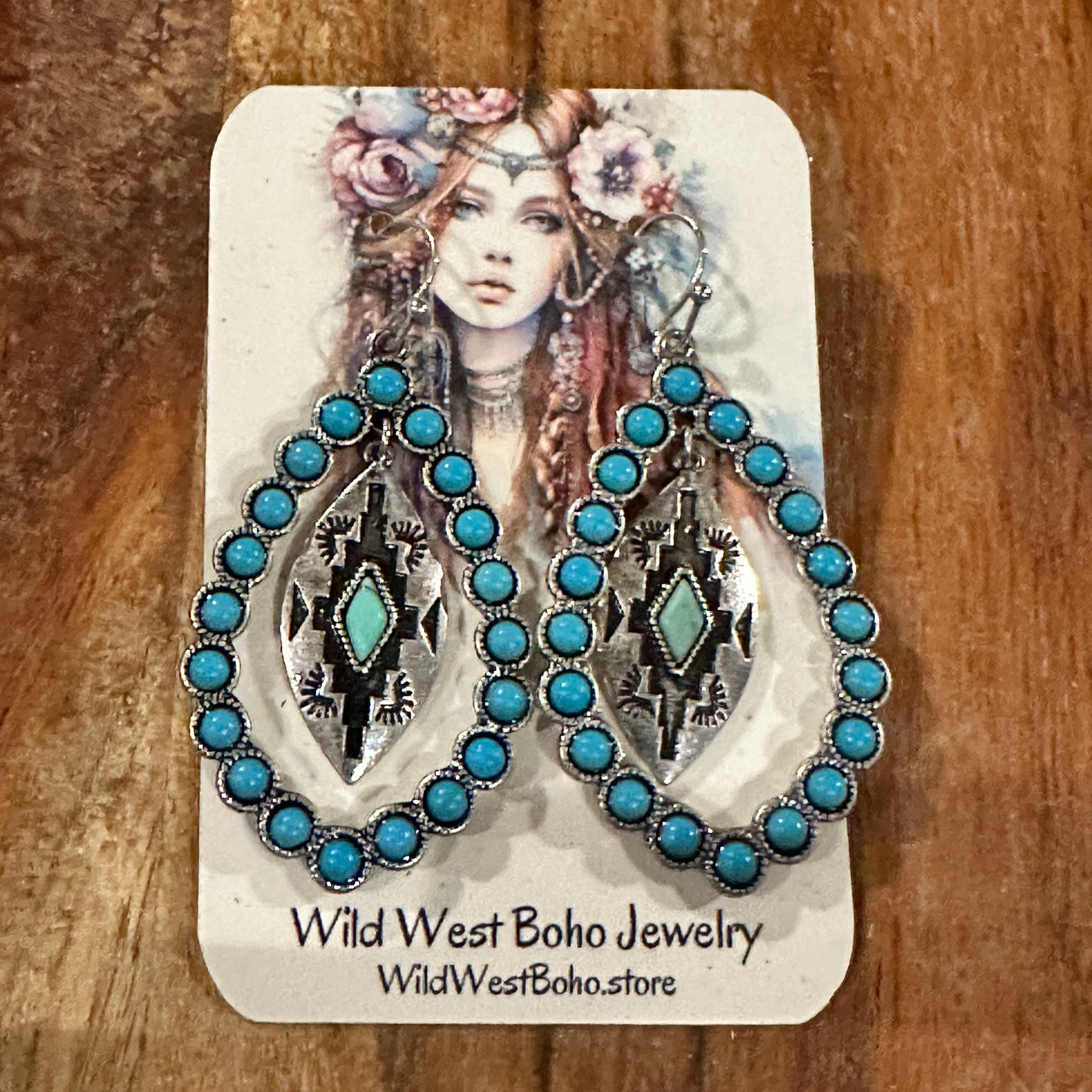 Aztec-inspired Teardrop Turquoise Earrings featuring a vibrant turquoise coating and intricate patterns, perfect for a bold, chic statement.