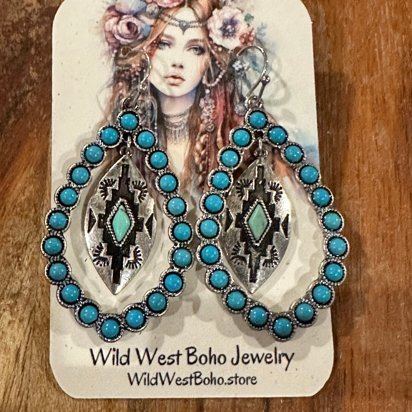 Aztec-inspired Teardrop Turquoise Earrings featuring a vibrant turquoise coating and intricate patterns, perfect for a bold, chic statement.