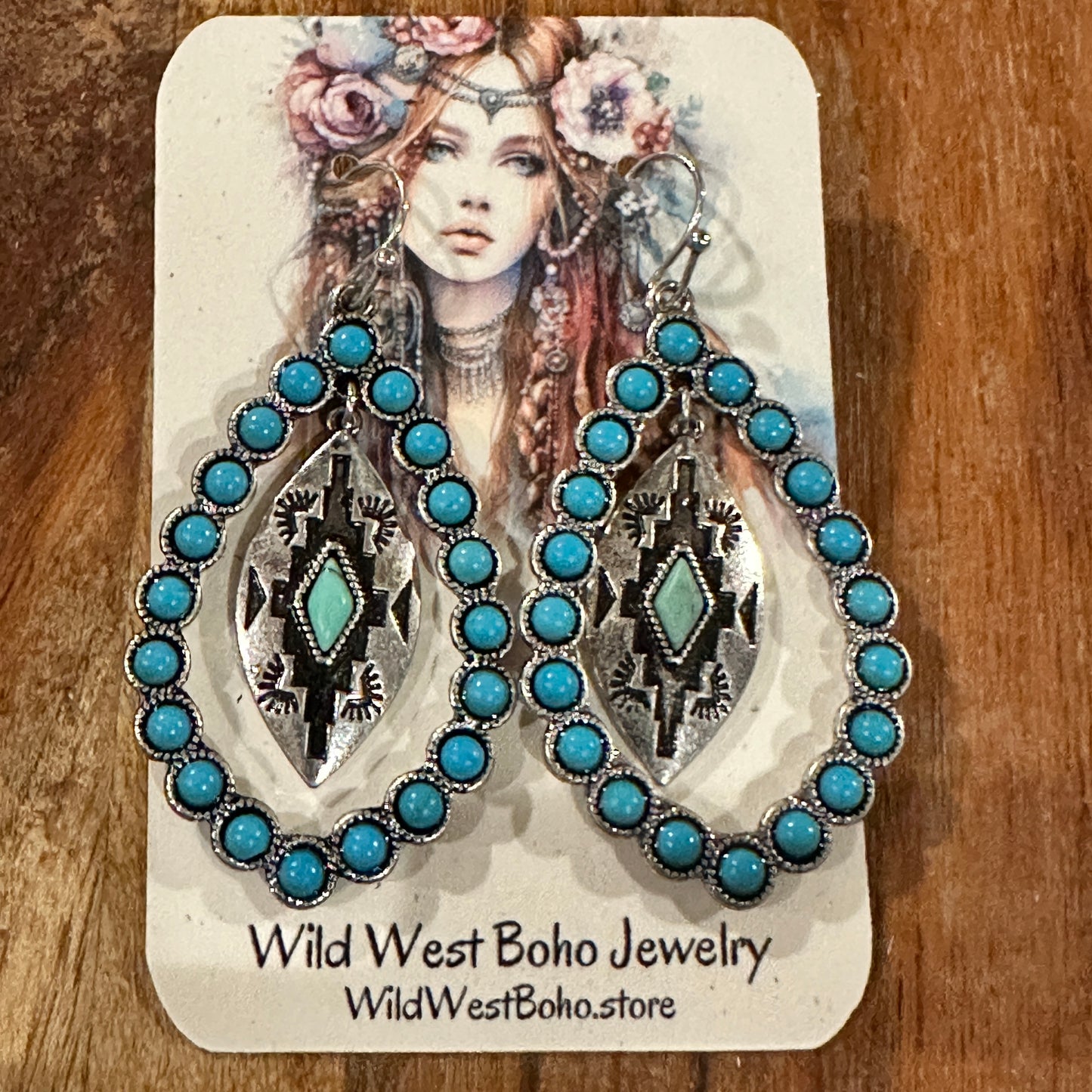 Aztec-inspired Teardrop Turquoise Earrings featuring a vibrant turquoise coating and intricate patterns, perfect for a bold, chic statement.