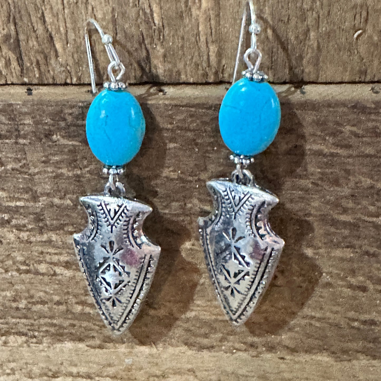 Elegant Boho Chic Native American Turquoise Silver Arrow Dangle Earrings Gift Box, perfect for any bohemian style lover.