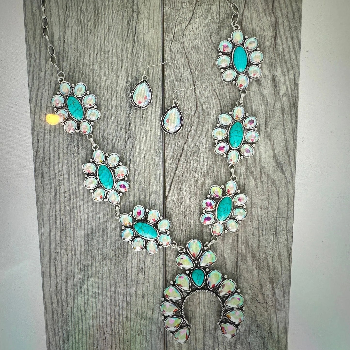 Boho Western Gemstone Squash Blossom Cowboy Turquoise Necklace/Drop Earring SetBoho Western Gemstone Squash Blossom Cowboy Turquoise Necklace/Drop Earring Set - Premium Pendant Necklace from Silver Elegant - Just $42! Shop now at Silver Elegant