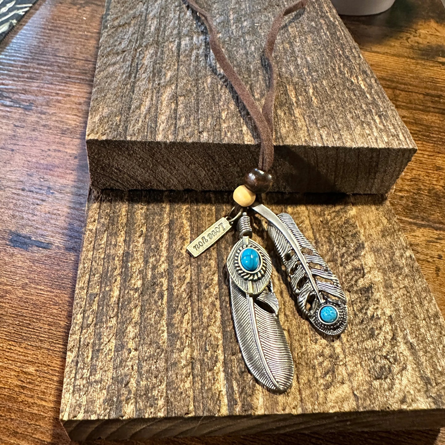 Southwest-Inspired Turquoise Feather Pendant Necklace on Brown Leather Cord, Gift-Ready Box - Silver Elegant