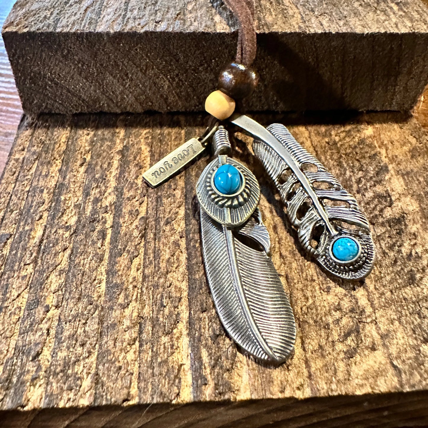 Southwest-Inspired Turquoise Feather Pendant Necklace on Brown Leather Cord, Gift-Ready Box - Silver Elegant