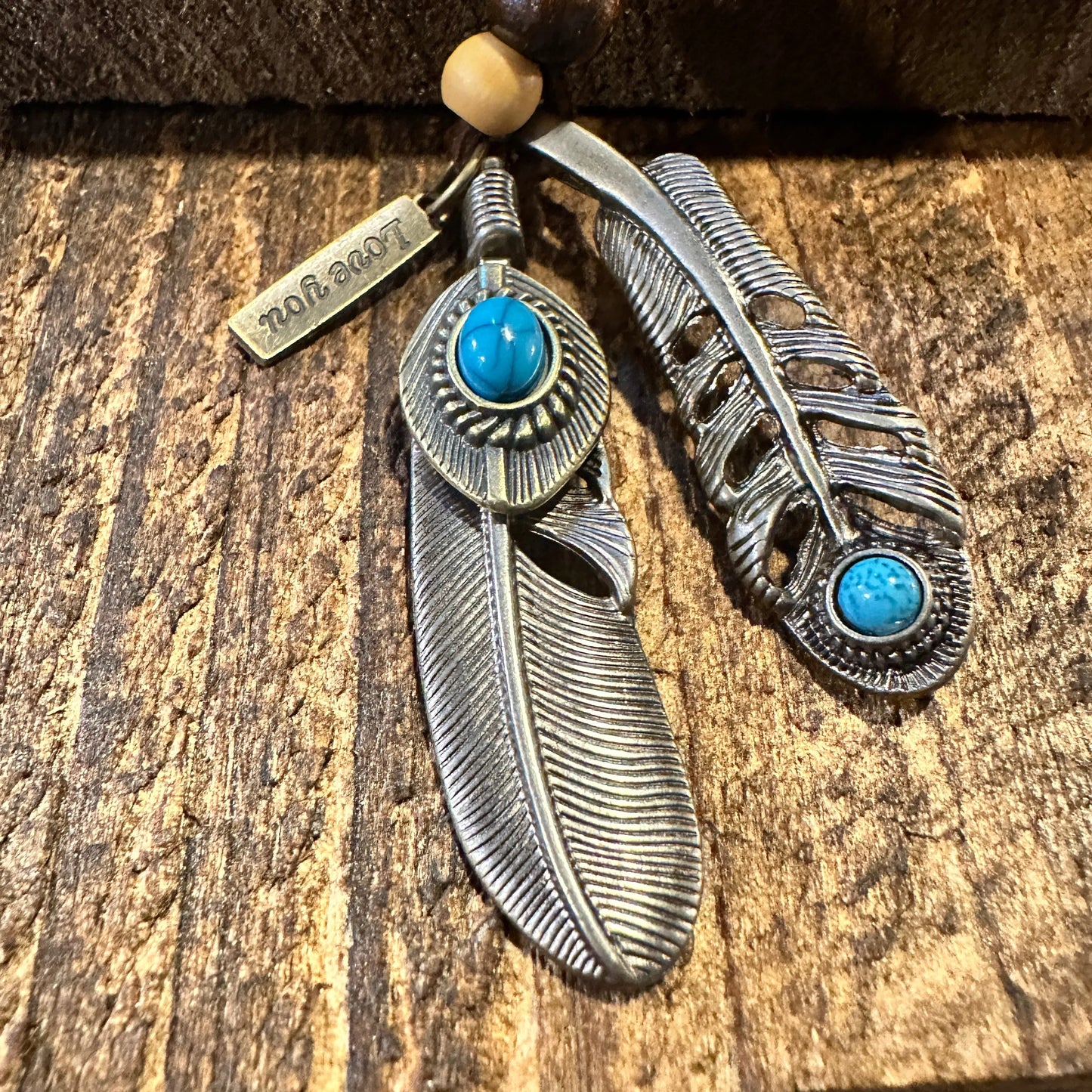 Southwest-Inspired Turquoise Feather Pendant Necklace on Brown Leather Cord, Gift-Ready Box - Silver Elegant