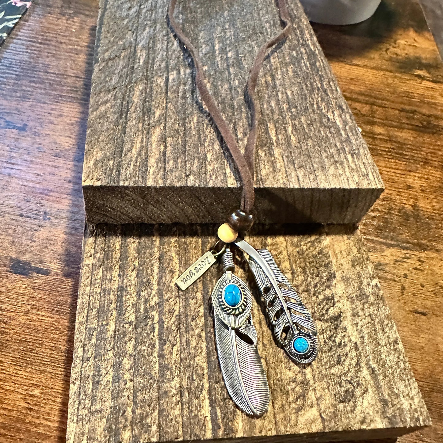 Southwest-Inspired Turquoise Feather Pendant Necklace on Brown Leather Cord, Gift-Ready Box - Silver Elegant