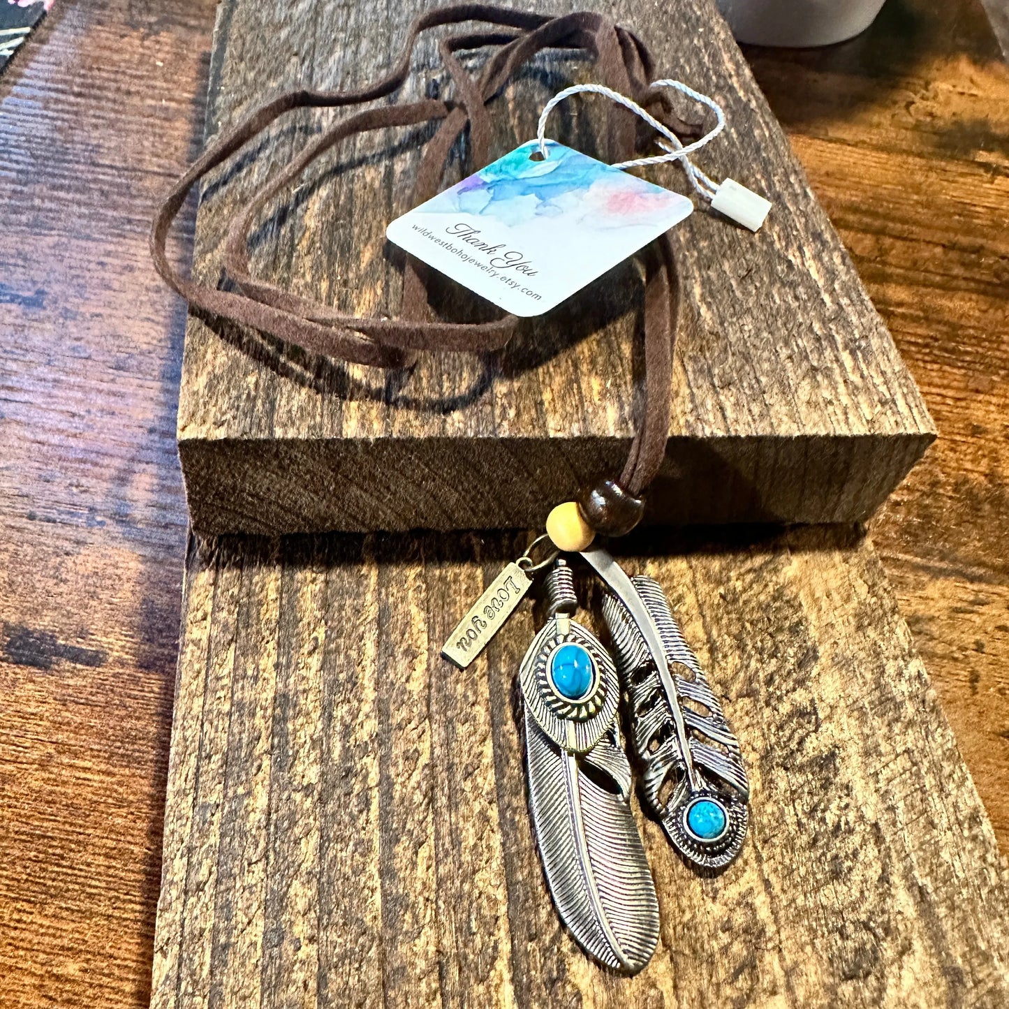 Southwest-Inspired Turquoise Feather Pendant Necklace on Brown Leather Cord, Gift-Ready Box - Silver Elegant