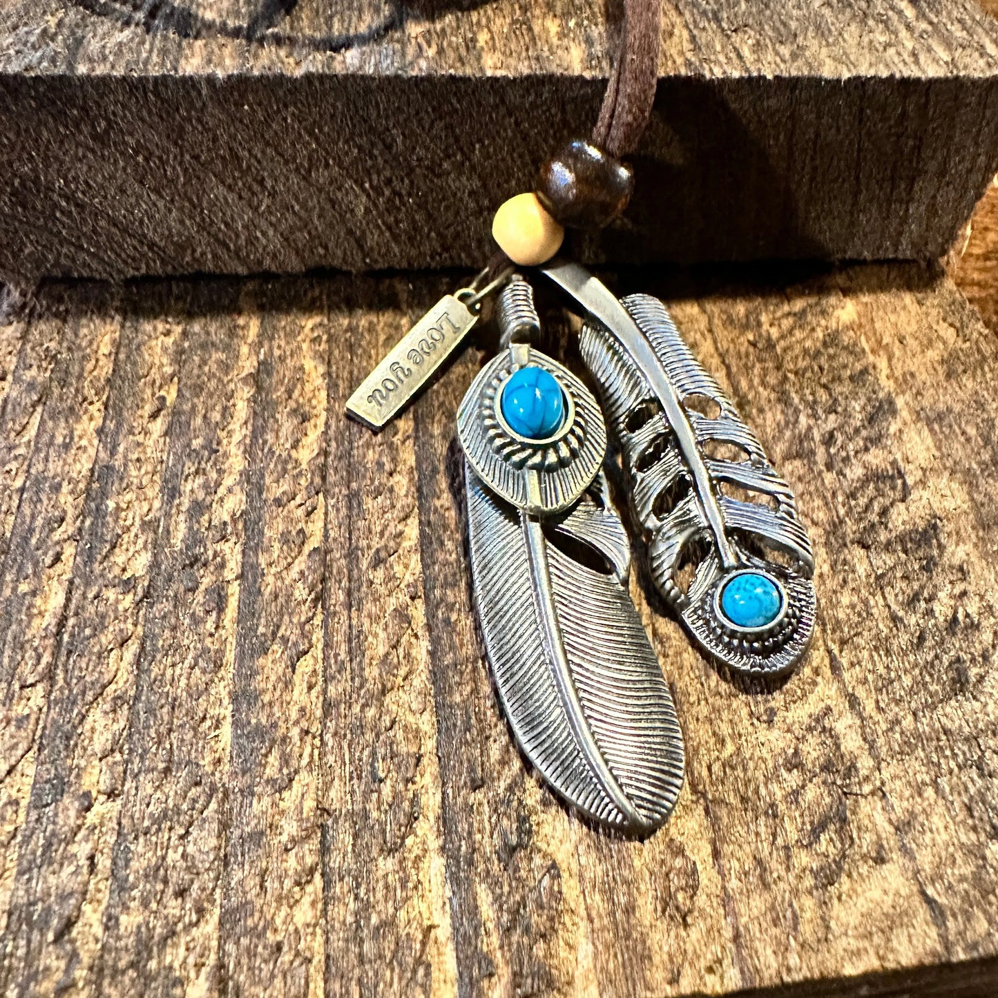 Southwest-Inspired Turquoise Feather Pendant Necklace on Brown Leather Cord, Gift-Ready Box - Silver Elegant