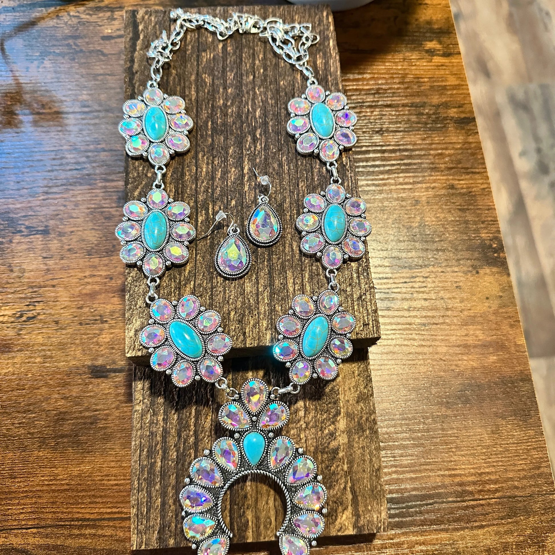 Boho Western Gemstone Squash Blossom Cowboy Turquoise Necklace/Drop Earring SetBoho Western Gemstone Squash Blossom Cowboy Turquoise Necklace/Drop Earring Set - Premium Pendant Necklace from Silver Elegant - Just $42! Shop now at Silver Elegant