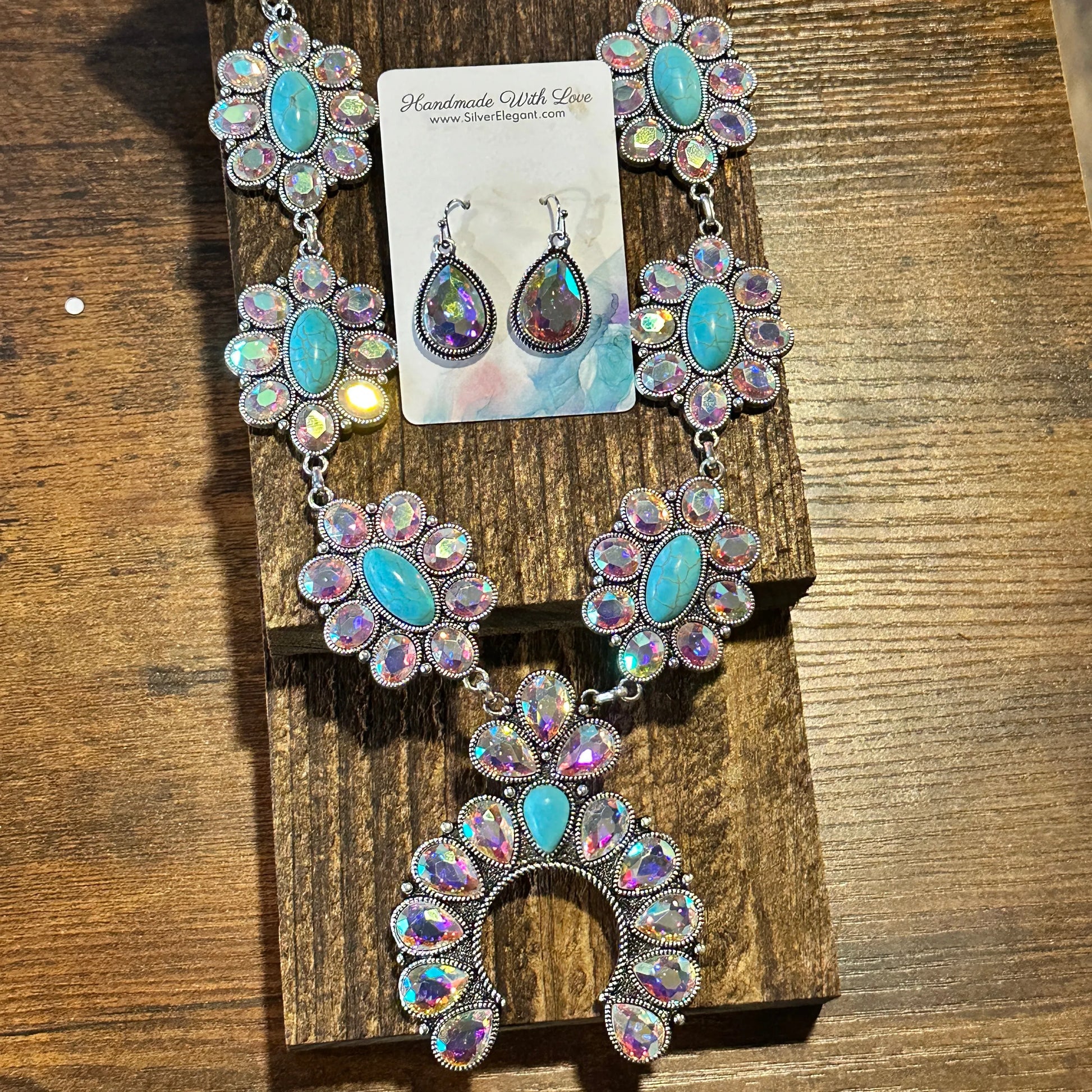 Boho Western Gemstone Squash Blossom Cowboy Turquoise Necklace/Drop Earring SetBoho Western Gemstone Squash Blossom Cowboy Turquoise Necklace/Drop Earring Set - Premium Pendant Necklace from Silver Elegant - Just $42! Shop now at Silver Elegant