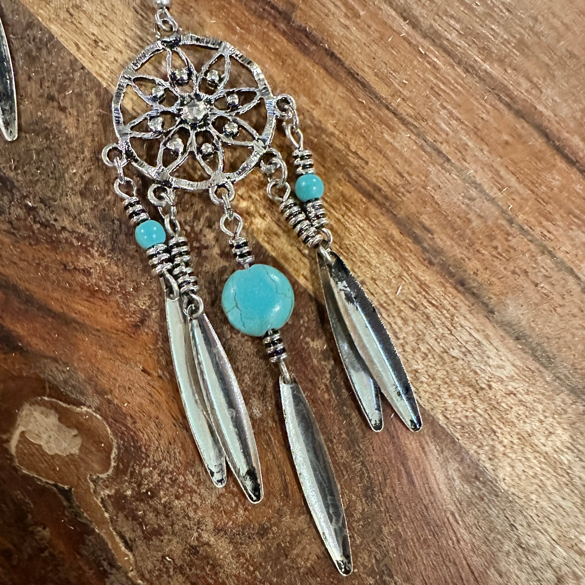 Bohemian Hippie Chic Dream Catcher Feather Drop Earrings featuring delicate silver feathers, dream catcher details, and lightweight design, ships in a gift box- Sliver Elegant