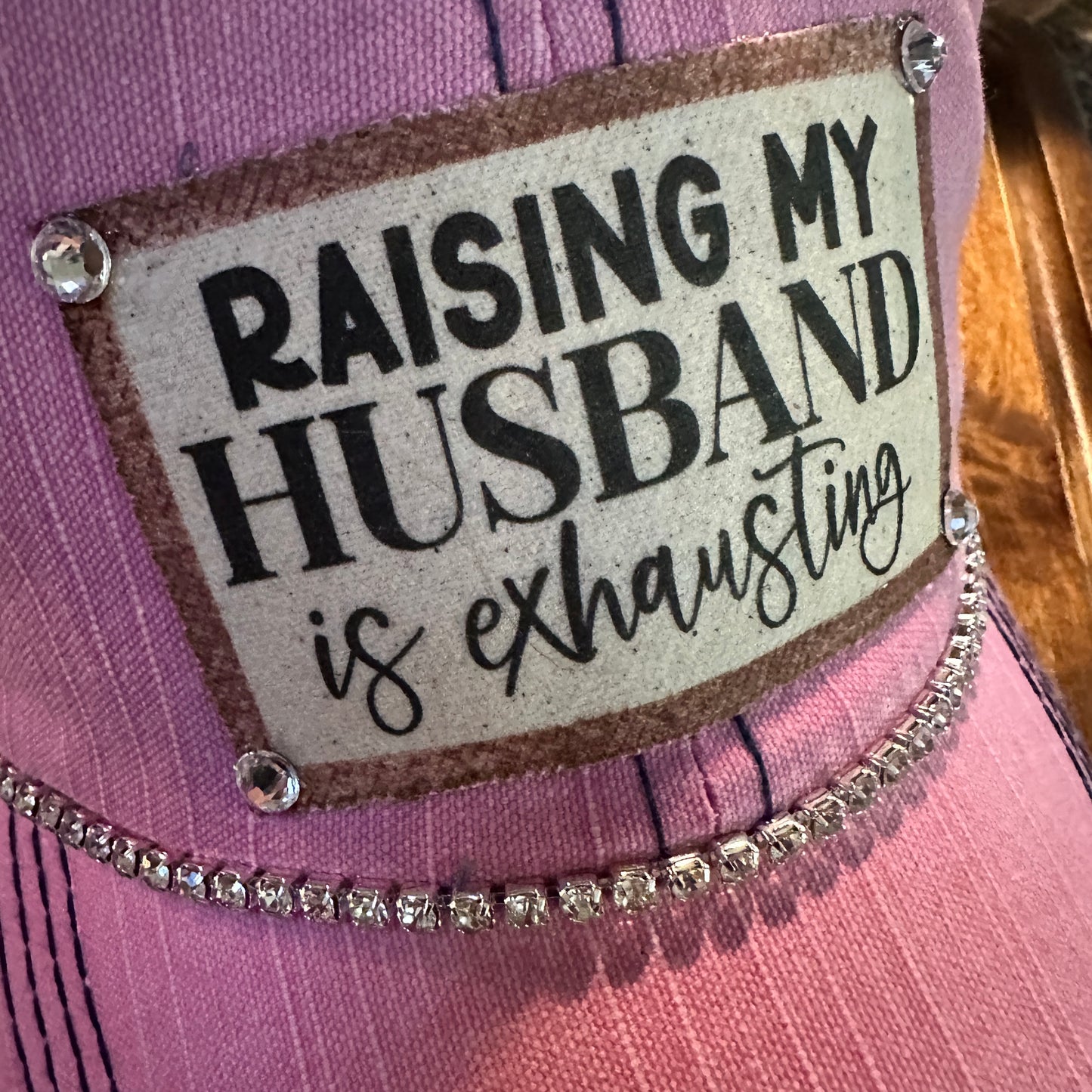 "Husband Taming is Tireless" Distressed Trucker Hat (#161): Bling / Pink / Jana's Flannels