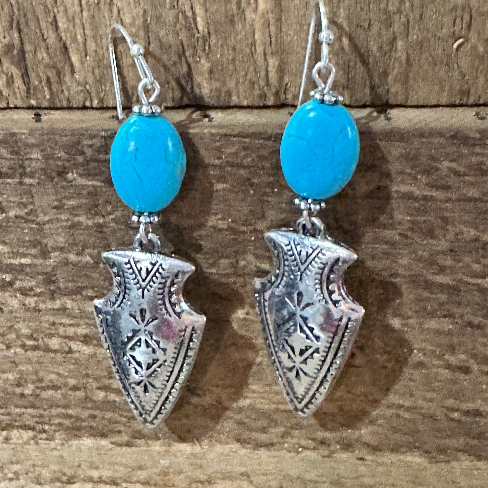 Elegant Boho Chic Native American Turquoise Silver Arrow Dangle Earrings Gift Box, perfect for any bohemian style lover.