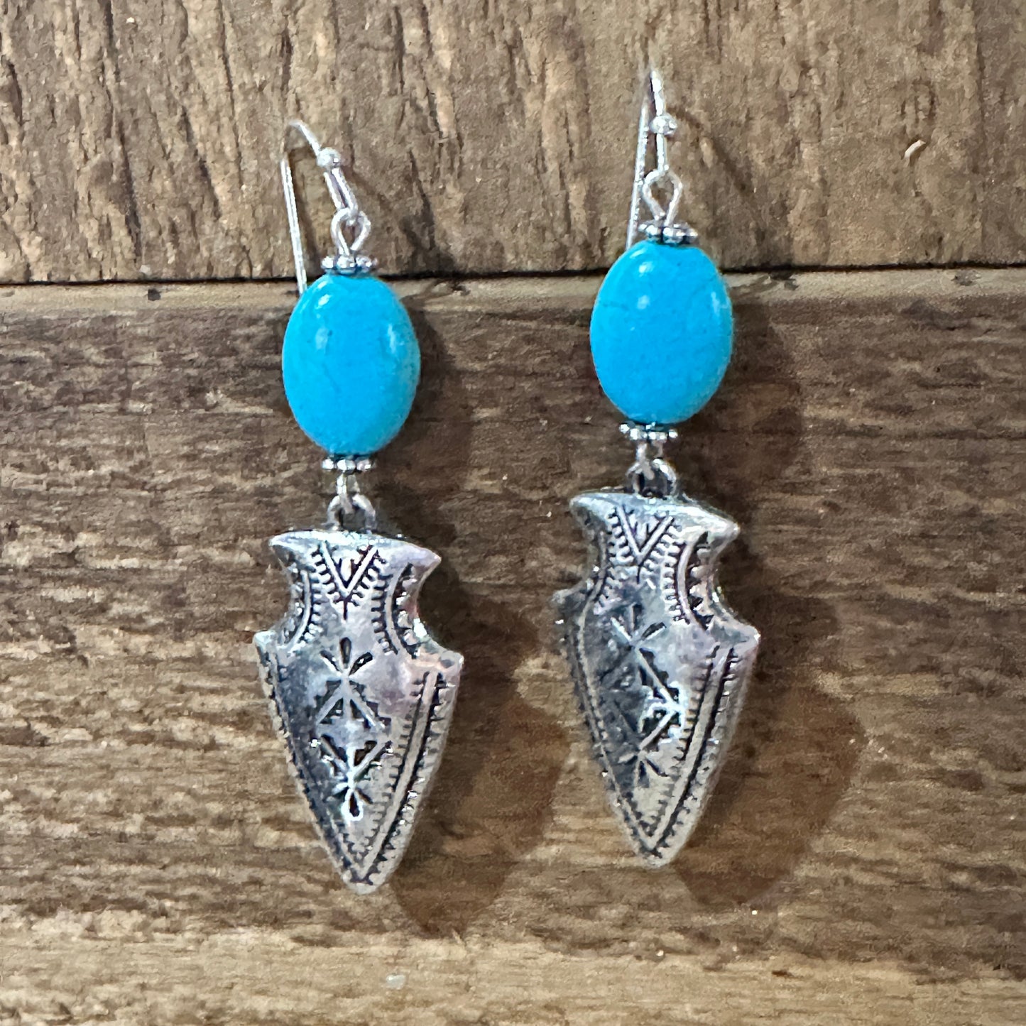 Boho Chic Native American Turquoise Silver Arrow Dangle Earrings Gift Box, perfect for adding elegance to any outfit.