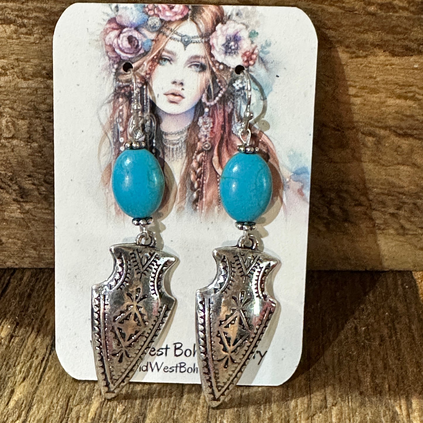 Boho Chic Native American Turquoise Silver Arrow Dangle Earrings Gift Box showcases unique handcrafted design and elegance.