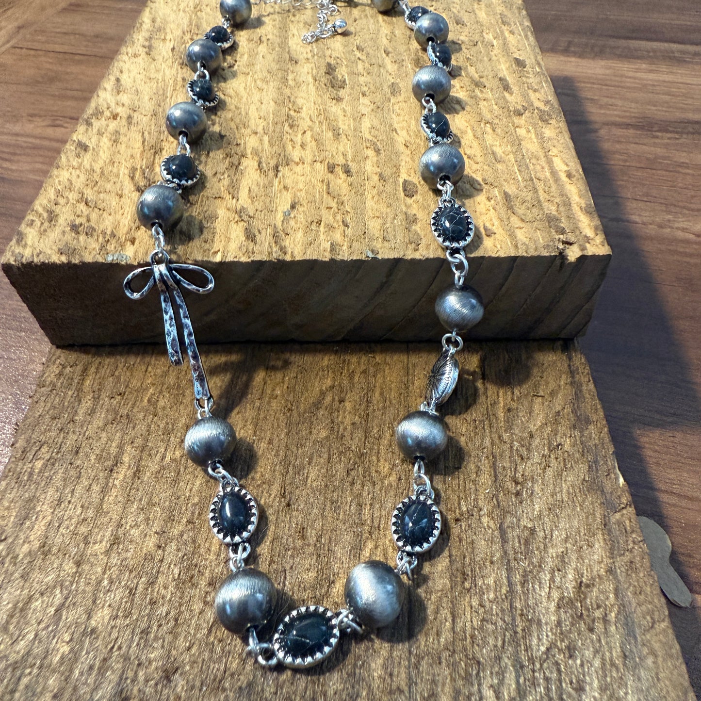 Western Style Navajo Pearl Stone Coquette Bow Necklace in Black and Brushed Silver