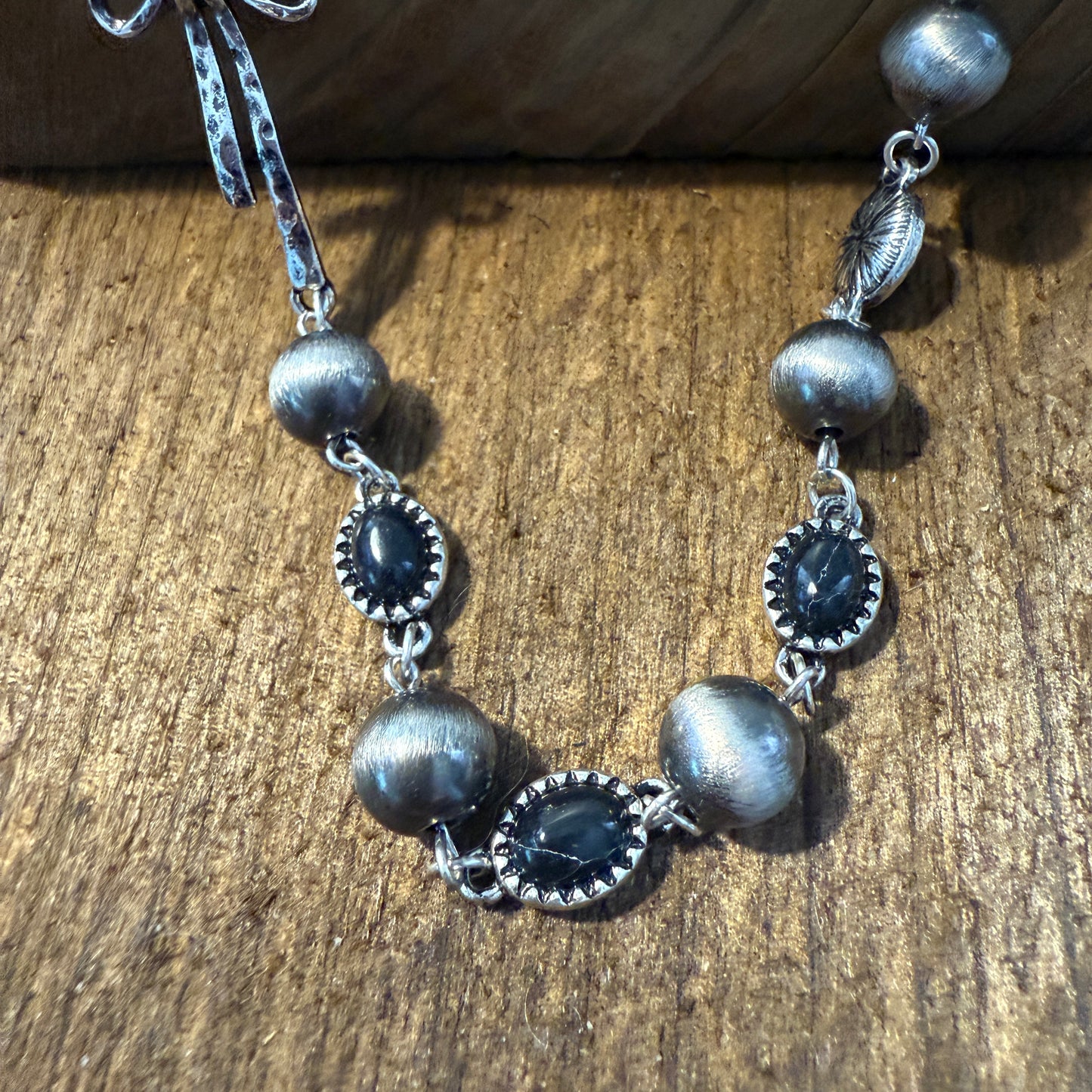 Western Style Navajo Pearl Stone Coquette Bow Necklace in Black and Brushed Silver