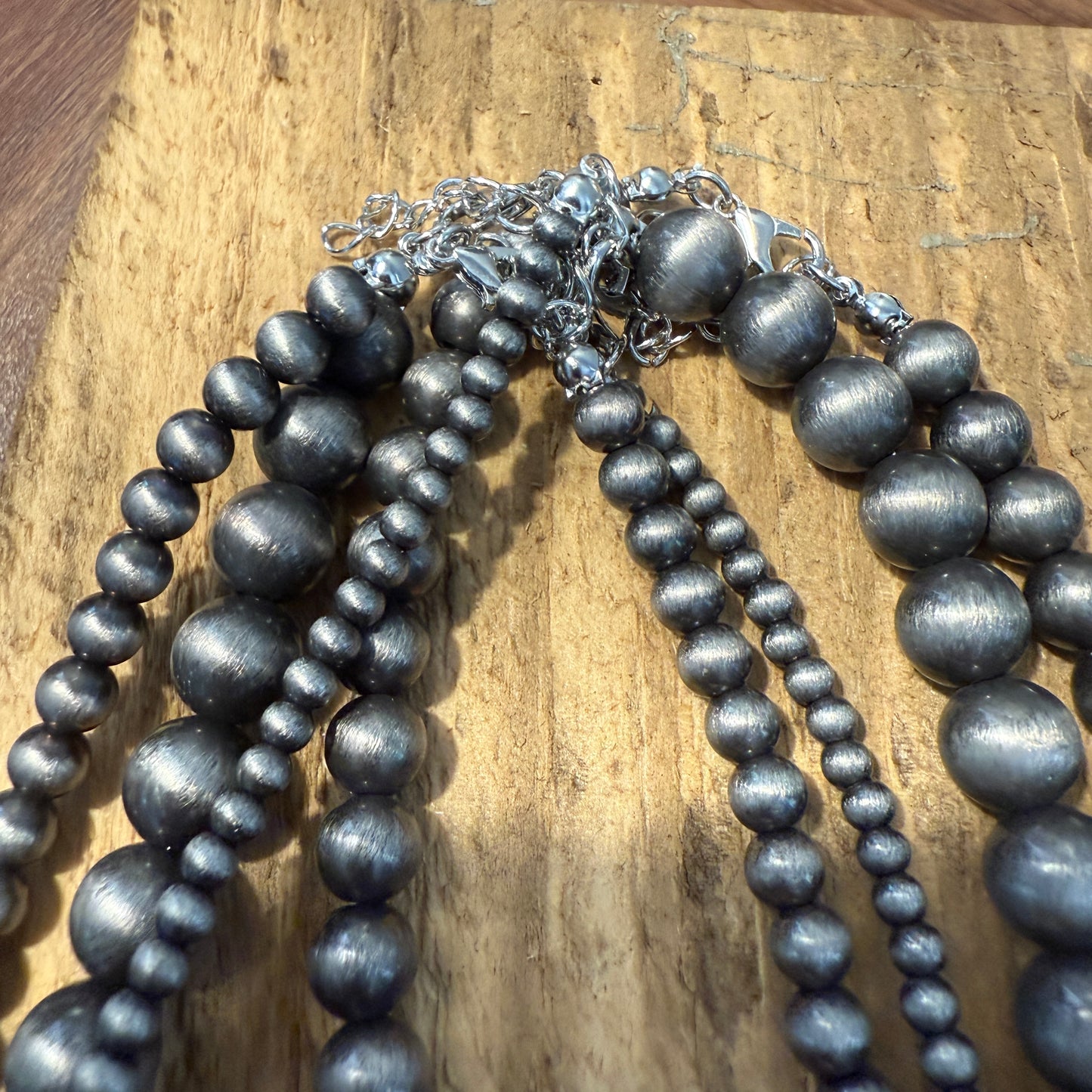 Four Strand Faux Pearl Necklace With Extender Layered Beads