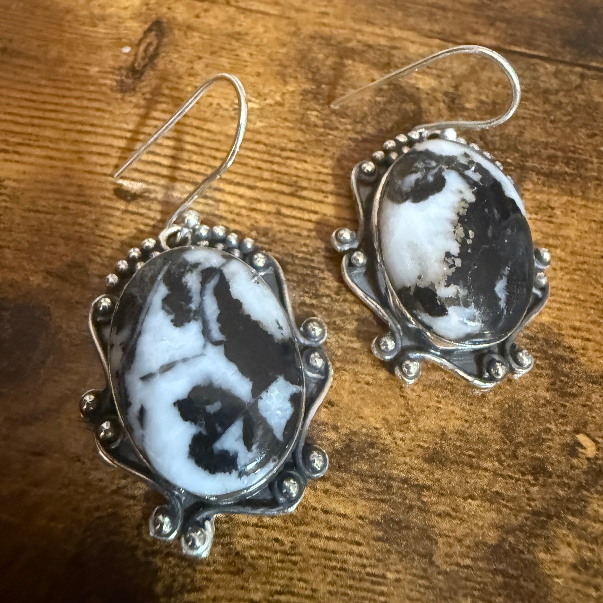 White Buffalo Turquoise Dahlia drop earrings in sterling silver with beaded surround and swirl accents