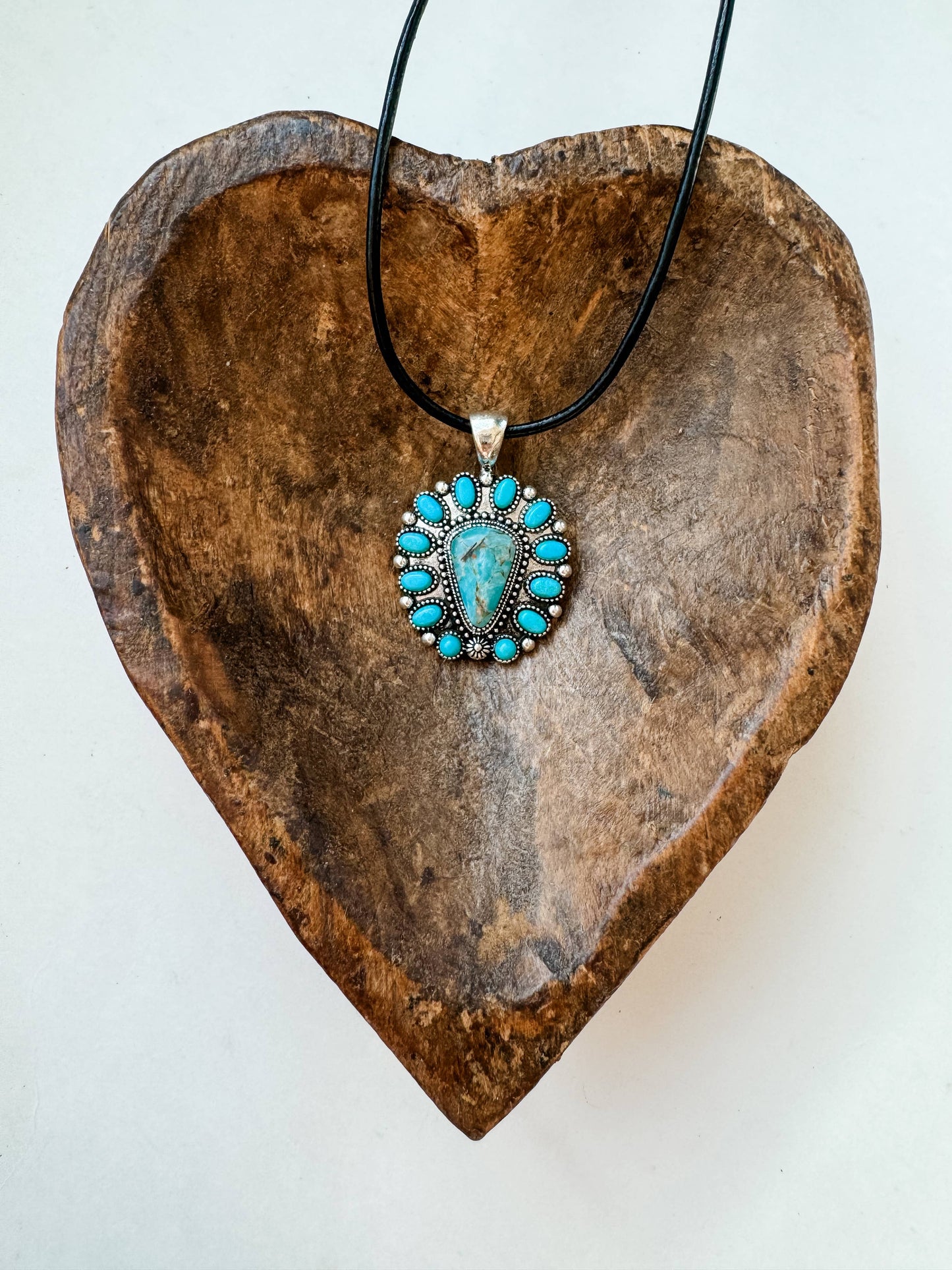 Western Thunderbird Pendant Necklace with Turquoise Conch and Burnished Silver Finish